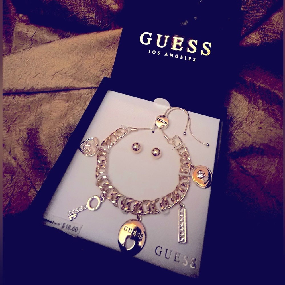Guess charm bracelet. Never worn.